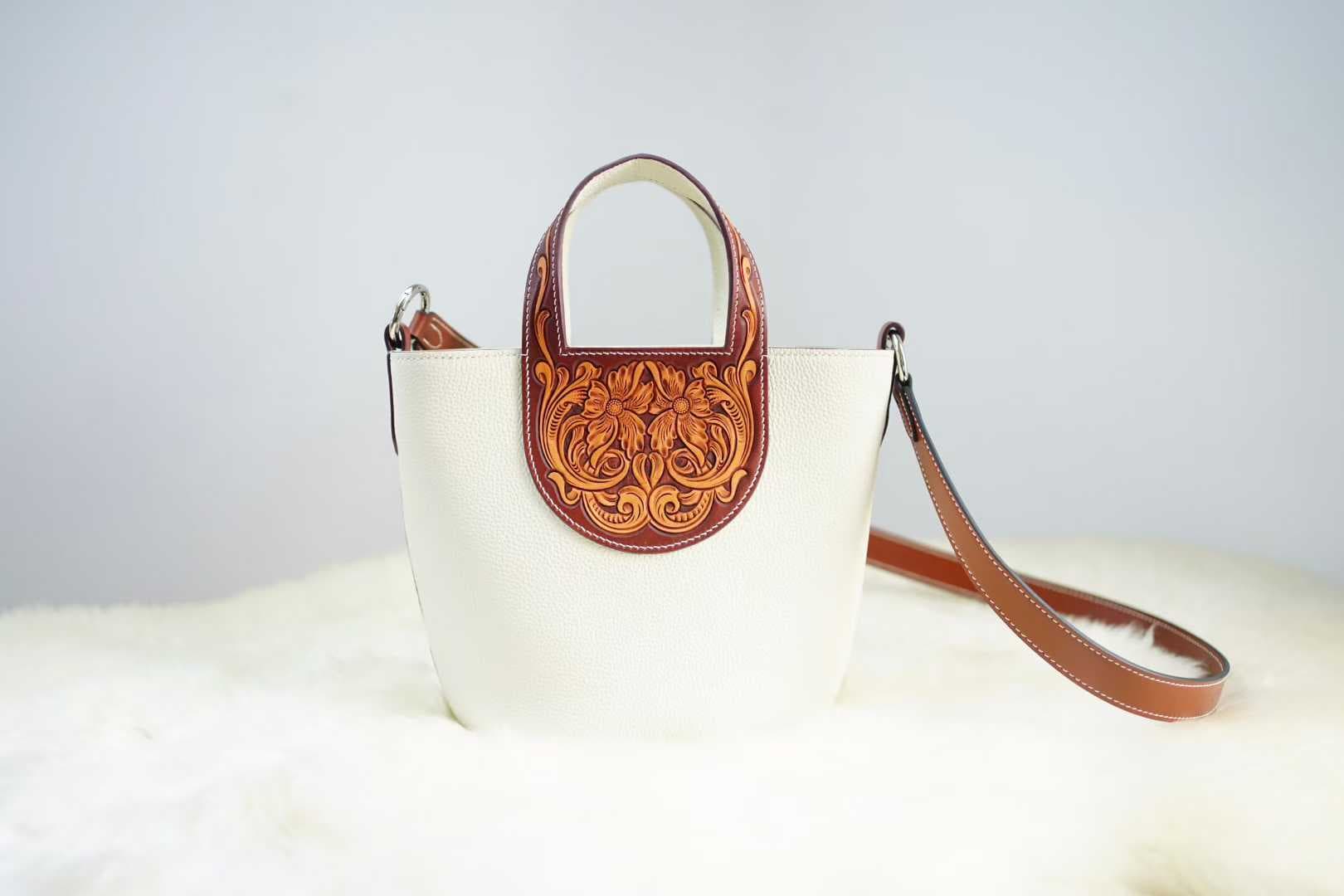 Linjin Luxury tan pebbled leather bucket bag with dark brown hand-tooled floral carved panel and handle, silver hardware, and detachable crossbody strap - 2