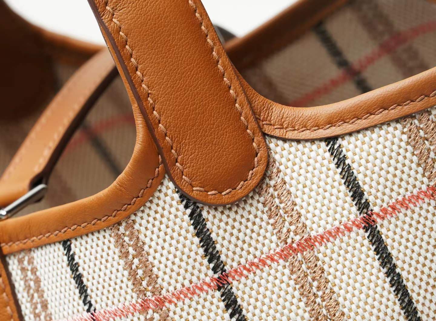 LINJIN LUXURY Picotin Lock 18 style bag in gold leather and plaid canvas, displayed on a natural woven stool against a clean white background - 9