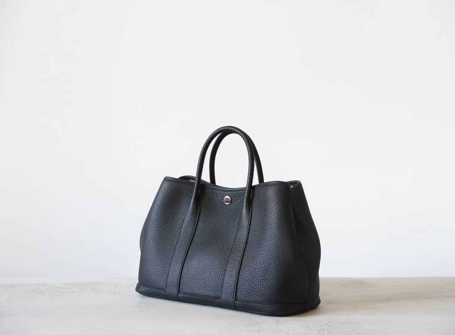 Front view of LINJIN LUXURY Garden Party 30 tote bag in Gold Togo leather, featuring white contrast stitching and snap closure on a white background - 2