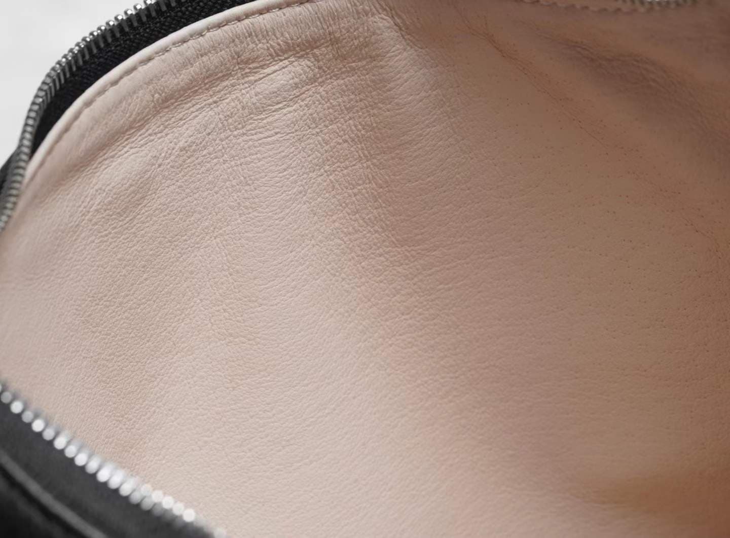 Linjin Luxury black pebbled deerskin lambskin crescent moon bag with single loop top handle and zip closure, minimal silhouette, displayed on a white surface - 8