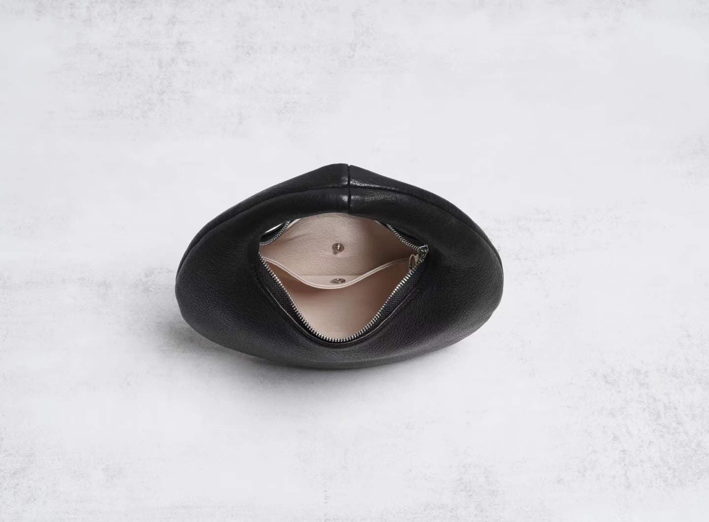 Linjin Luxury black pebbled deerskin lambskin crescent moon bag with single loop top handle and zip closure, minimal silhouette, displayed on a white surface - 9