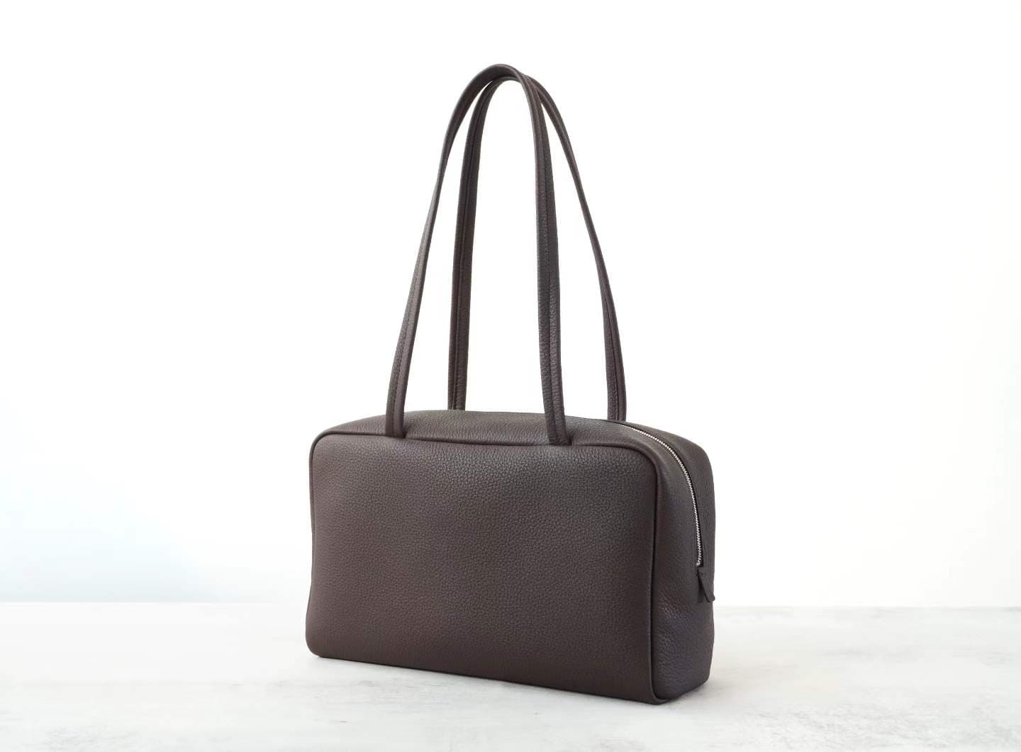 Linjin Luxury dark brown pebbled cowhide leather shoulder bag with slim flat handles and double silver-tone zip closure, minimal logo-free design, on a white background - 2