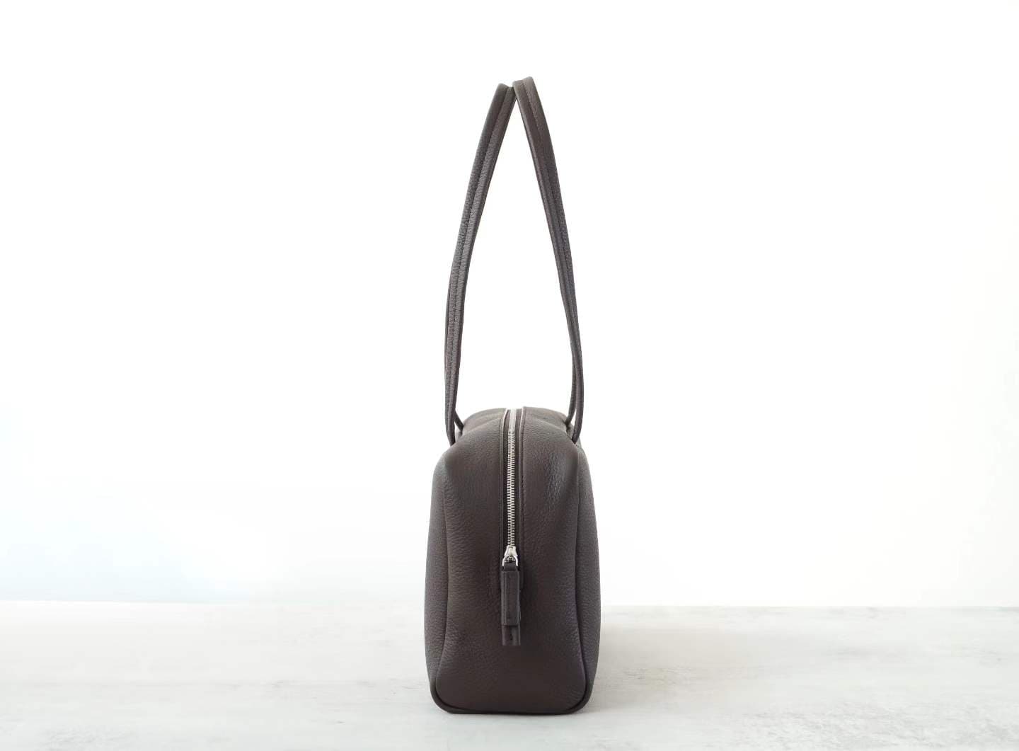 Linjin Luxury dark brown pebbled cowhide leather shoulder bag with slim flat handles and double silver-tone zip closure, minimal logo-free design, on a white background - 3