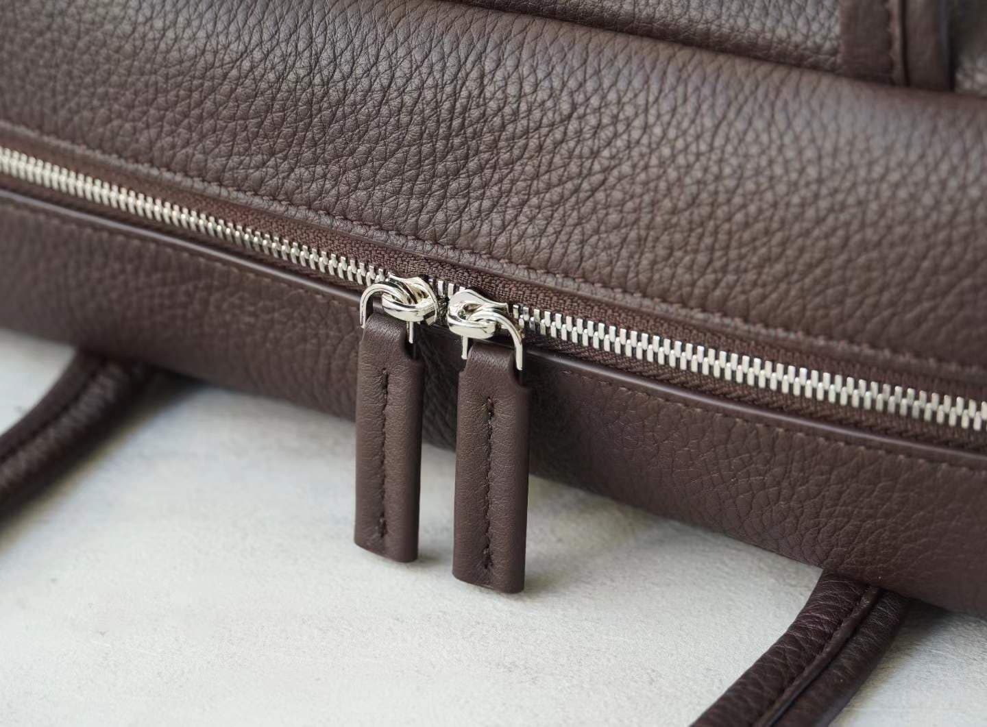 Linjin Luxury dark brown pebbled cowhide leather shoulder bag with slim flat handles and double silver-tone zip closure, minimal logo-free design, on a white background - 7