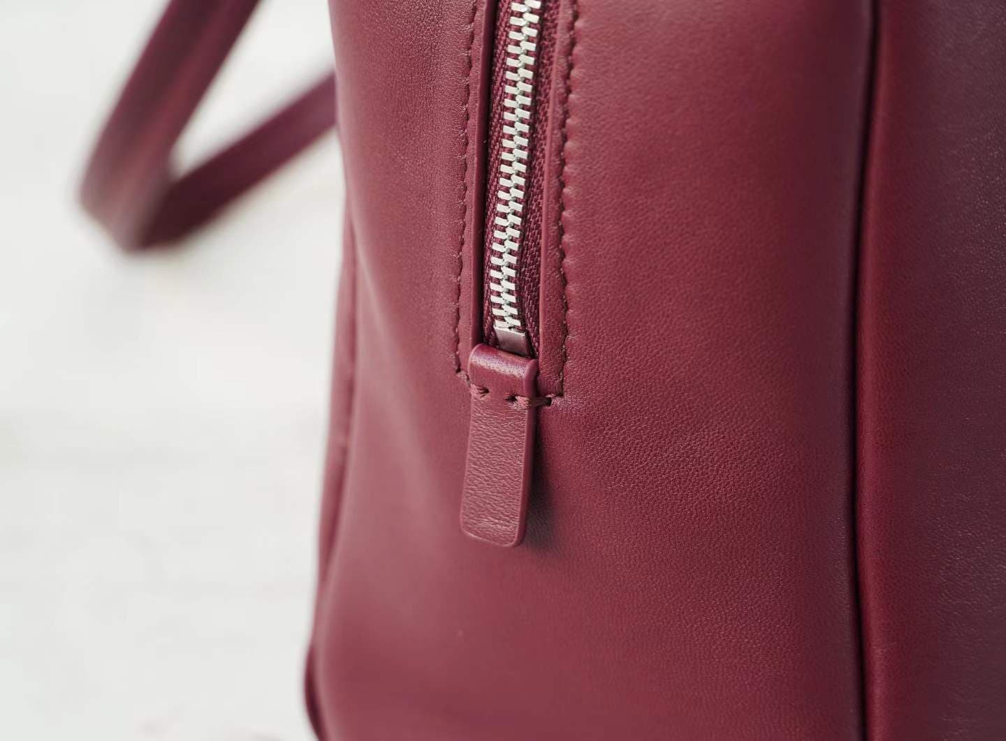 Linjin Luxury burgundy smooth cowhide leather shoulder bag with slim flat handles and double silver-tone zip closure, minimal logo-free design, on a white background - 4