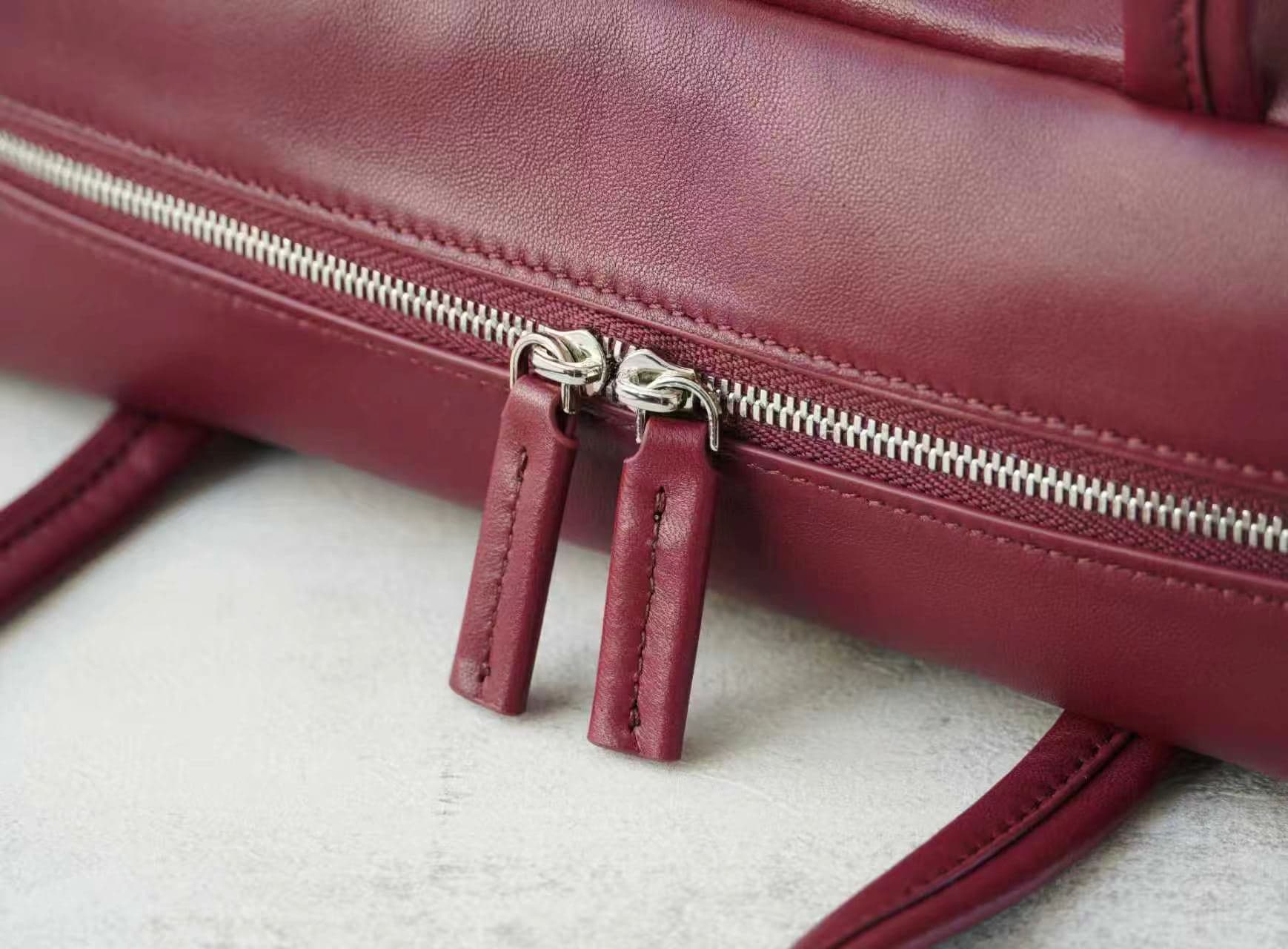 Linjin Luxury burgundy smooth cowhide leather shoulder bag with slim flat handles and double silver-tone zip closure, minimal logo-free design, on a white background - 6