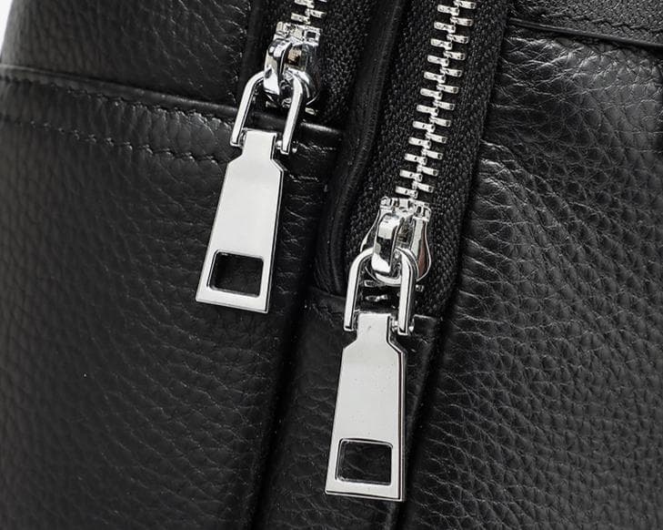Linjin Luxury black pebbled full-grain cowhide men's backpack with multiple zip compartments, front zip pocket, silver-tone hardware, padded shoulder straps, and top carry handle, 26 × 11 × 40 cm - 9