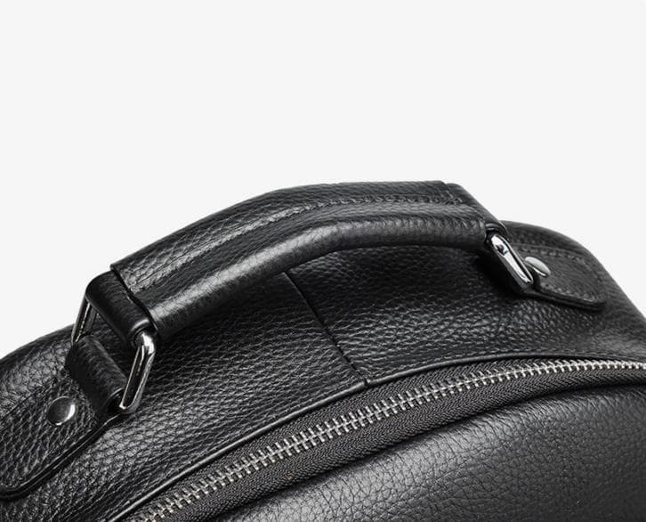 Linjin Luxury black pebbled full-grain cowhide men's backpack with multiple zip compartments, front zip pocket, silver-tone hardware, padded shoulder straps, and top carry handle, 26 × 11 × 40 cm - 10