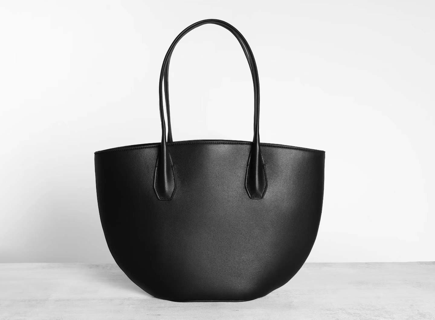 oversized curved saddle leather tote bags